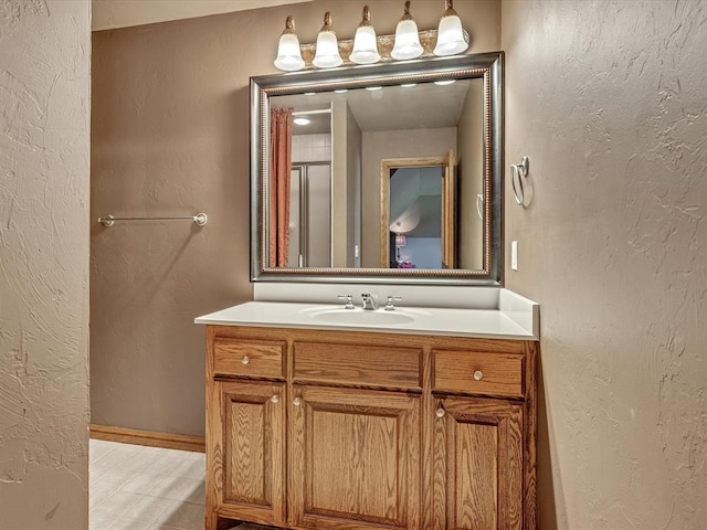 4109 Riva Ridge Ct, Edmond, OK 73003 - bathroom with vanity, a shower with door, and tile patterned floors