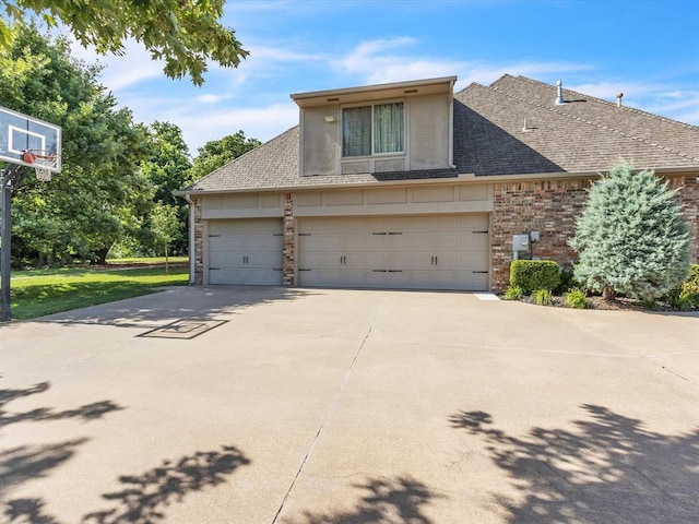 4109 Riva Ridge Ct, Edmond, OK 73003 - traditional-style house with concrete driveway, a shingled roof, brick siding, and a garage