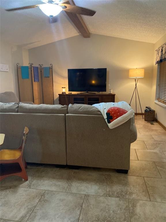 513 9th Street Cir, Hydro, OK 73048 - living area featuring ceiling fan and baseboards
