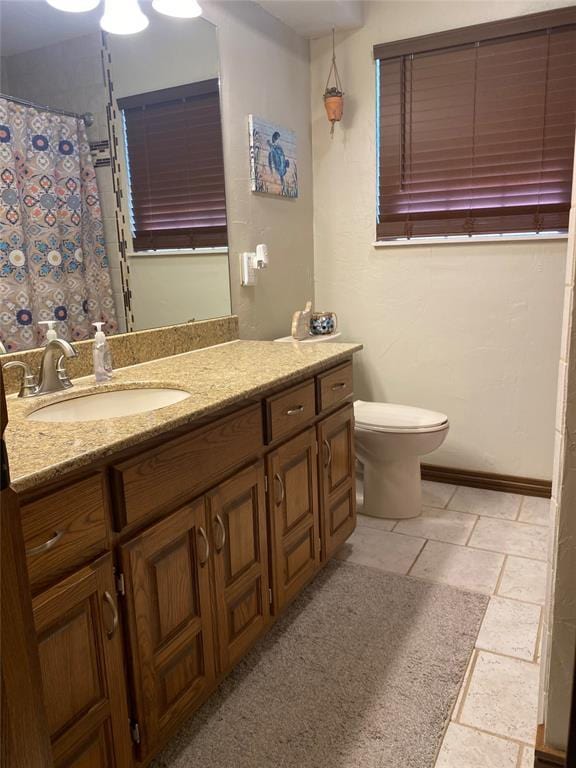 513 9th Street Cir, Hydro, OK 73048 - full bathroom featuring vanity, stone tile flooring, and curtained shower