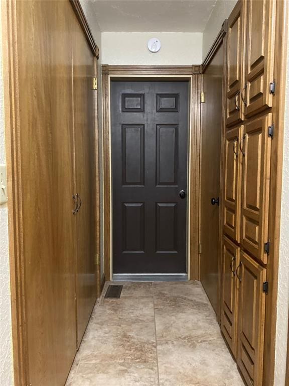 513 9th Street Cir, Hydro, OK 73048 - doorway featuring light stone finish floors