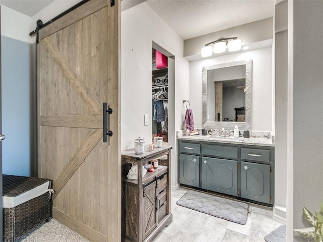 764 S Sara Rd, Tuttle, OK 73089 - bathroom with vanity and a spacious closet