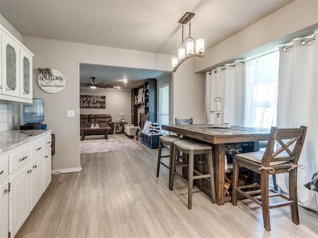 764 S Sara Rd, Tuttle, OK 73089 - dining space featuring light wood finished floors, healthy amount of natural light, and ceiling fan