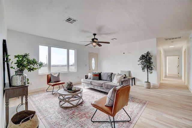 1646 County Road 1245, Tuttle, OK 73089 - living area with light wood-type flooring and ceiling fan