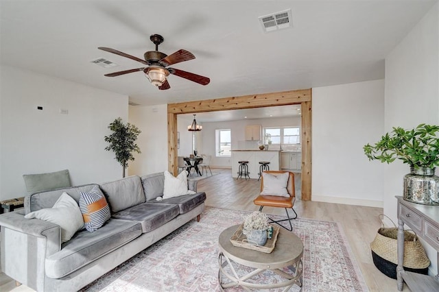 1646 County Road 1245, Tuttle, OK 73089 - living room with light wood finished floors and ceiling fan