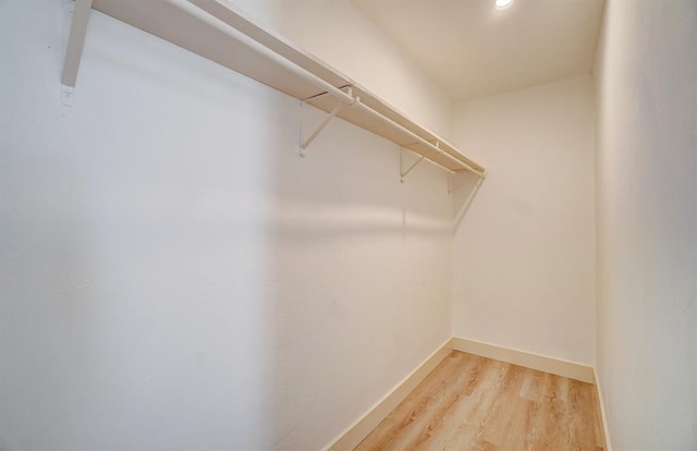 1646 County Road 1245, Tuttle, OK 73089 - spacious closet with wood finished floors