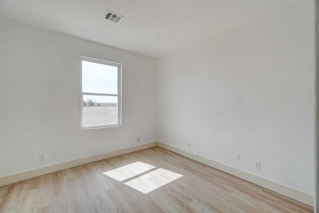 1646 County Road 1245, Tuttle, OK 73089 - spare room with wood finished floors and baseboards