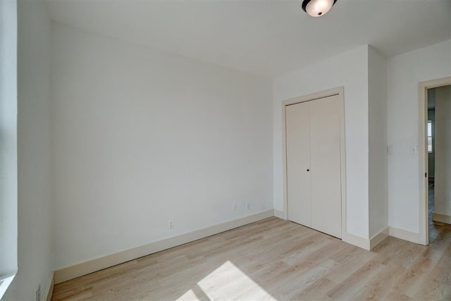1646 County Road 1245, Tuttle, OK 73089 - unfurnished bedroom featuring wood finished floors and a closet