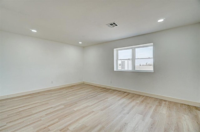1646 County Road 1245, Tuttle, OK 73089 - empty room with wood finished floors and recessed lighting