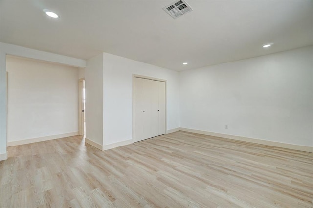 1646 County Road 1245, Tuttle, OK 73089 - empty room with light wood-type flooring and recessed lighting
