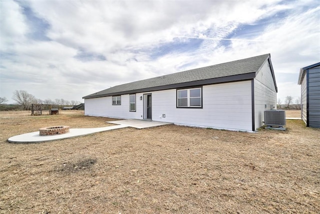 1646 County Road 1245, Tuttle, OK 73089 - back of house with an outdoor fire pit and a patio