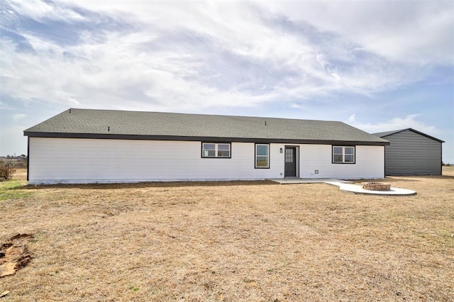 1646 County Road 1245, Tuttle, OK 73089 - view of front of home with a fire pit, a front lawn, and a patio