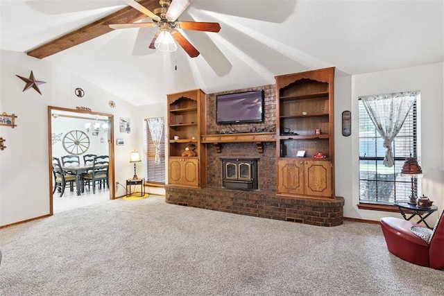 410 E Johnson St, Lexington, OK 73051 - living area featuring carpet floors, ceiling fan, and a wood stove
