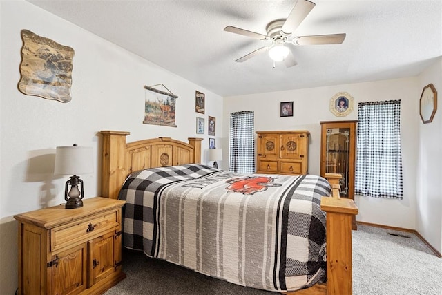 410 E Johnson St, Lexington, OK 73051 - bedroom featuring dark colored carpet and a ceiling fan