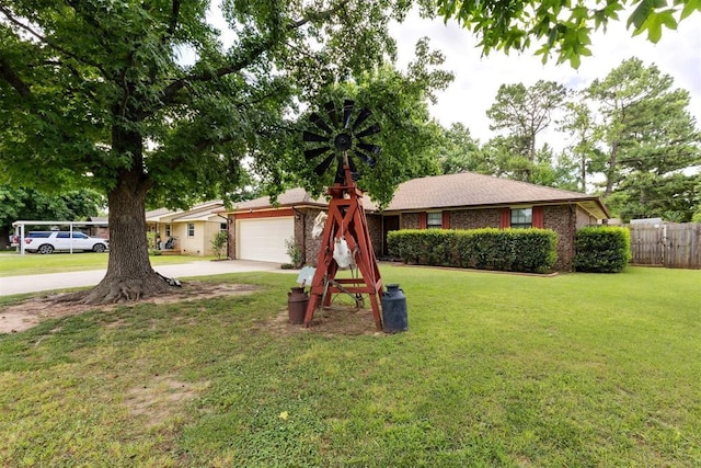 410 E Johnson St, Lexington, OK 73051 - single story home with concrete driveway and an attached garage