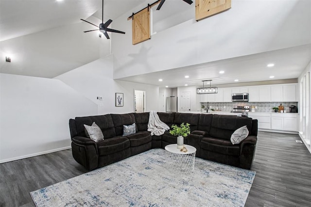 1600 Silver Stone Rd, Blanchard, OK 73010 - living area featuring dark wood finished floors, ceiling fan, high vaulted ceiling, and recessed lighting