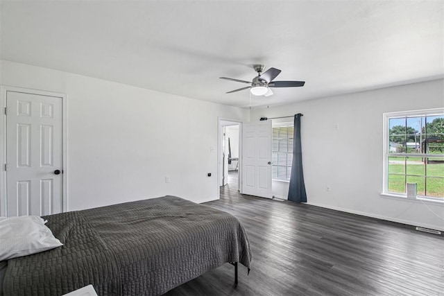 1600 Silver Stone Rd, Blanchard, OK 73010 - bedroom with dark wood-style flooring and ceiling fan