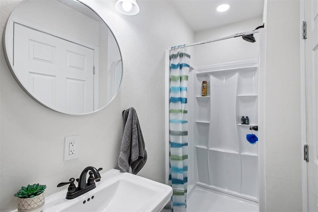 1600 Silver Stone Rd, Blanchard, OK 73010 - full bathroom featuring a stall shower and recessed lighting