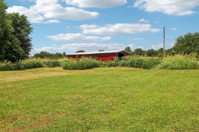 1600 Silver Stone Rd, Blanchard, OK 73010 - view of green lawn with a pole building and an outdoor structure