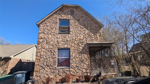 121 N High Ave, Shawnee, OK 74801 - view of side of home with stone siding