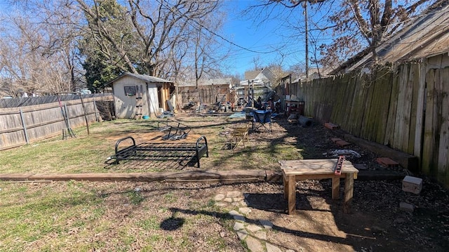 121 N High Ave, Shawnee, OK 74801 - fenced backyard featuring a storage shed