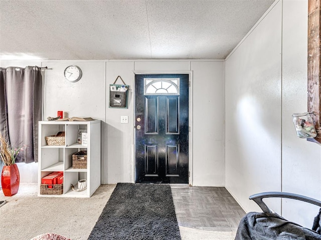 106411 Happy Trails Rd, Mcloud, OK 74851 - entryway featuring a textured ceiling