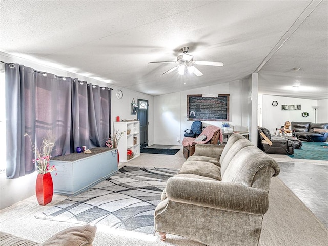 106411 Happy Trails Rd, Mcloud, OK 74851 - living area with ceiling fan, lofted ceiling, and a textured ceiling