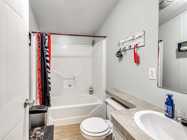 106411 Happy Trails Rd, Mcloud, OK 74851 - bathroom featuring a textured ceiling, vanity, shower / tub combo with curtain, and wood finished floors