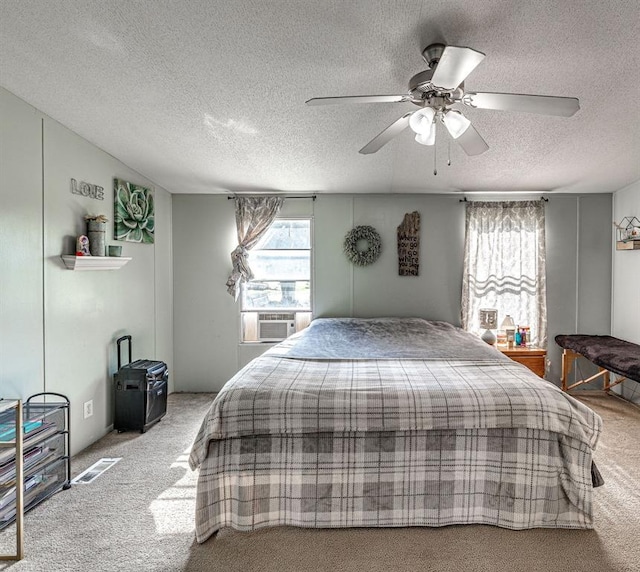 106411 Happy Trails Rd, Mcloud, OK 74851 - bedroom featuring carpet flooring, a textured ceiling, cooling unit, and a ceiling fan