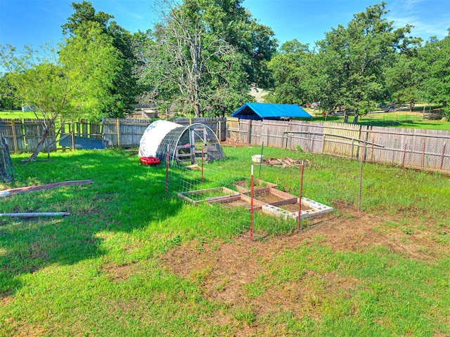 106411 Happy Trails Rd, Mcloud, OK 74851 - fenced backyard with a garden
