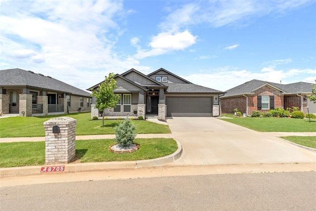 8705 Gibbs Dr, Oklahoma City, OK 73135 - view of front of property with a garage, concrete driveway, a front yard, and brick siding