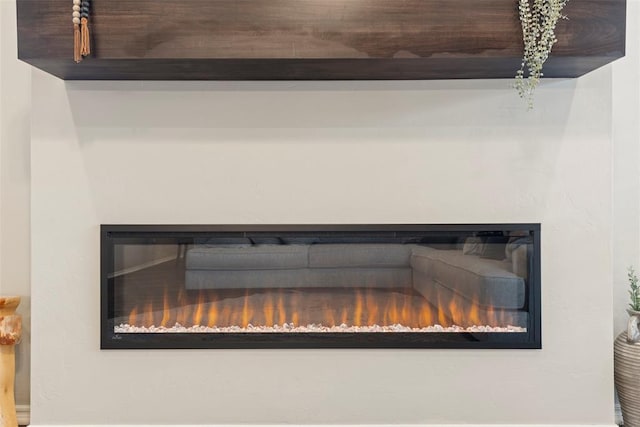 8705 Gibbs Dr, Oklahoma City, OK 73135 - detailed view of a glass covered fireplace