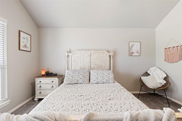 8705 Gibbs Dr, Oklahoma City, OK 73135 - bedroom with vaulted ceiling, dark colored carpet, and multiple windows