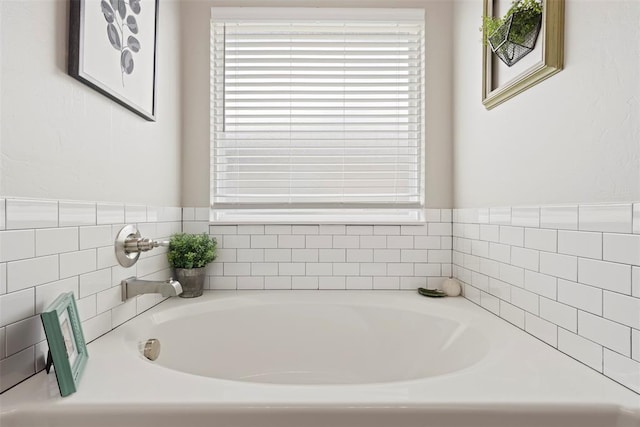 8705 Gibbs Dr, Oklahoma City, OK 73135 - bathroom with a garden tub and plenty of natural light