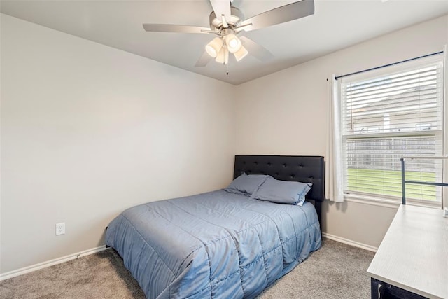 8705 Gibbs Dr, Oklahoma City, OK 73135 - carpeted bedroom with multiple windows and ceiling fan