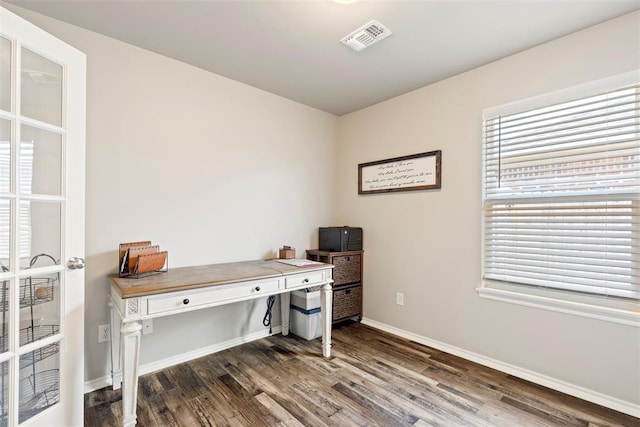 8705 Gibbs Dr, Oklahoma City, OK 73135 - home office with dark wood finished floors and baseboards