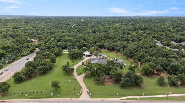 2800 E 15th St, Edmond, OK 73013 - aerial overview of property's location with a forest