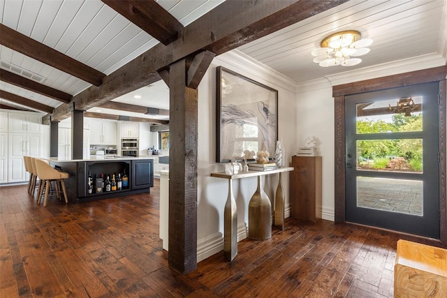 2800 E 15th St, Edmond, OK 73013 - bar area with dark wood-style flooring, a chandelier, double oven, a wood ceiling with exposed beams, and crown molding