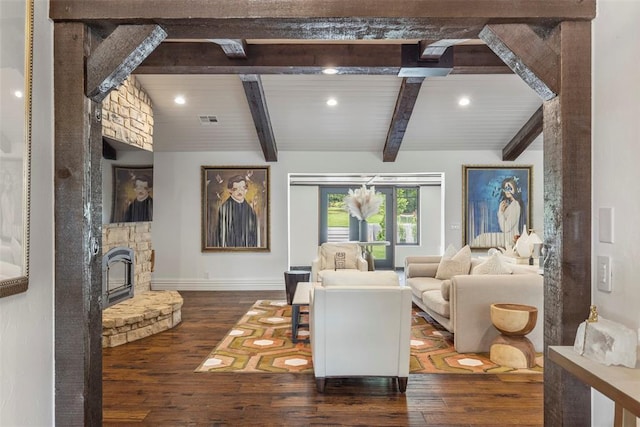 2800 E 15th St, Edmond, OK 73013 - living room featuring wood finished floors, beam ceiling, recessed lighting, and a stone fireplace