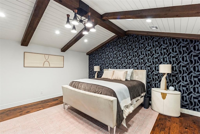 2800 E 15th St, Edmond, OK 73013 - bedroom featuring wood finished floors, recessed lighting, a chandelier, an accent wall, and wooden ceiling