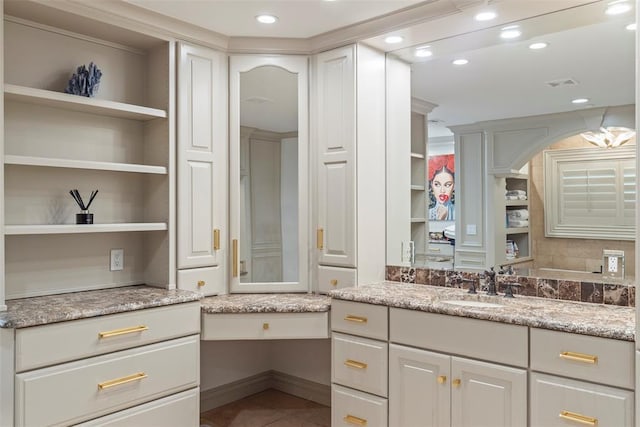 2800 E 15th St, Edmond, OK 73013 - bathroom with vanity, tile patterned flooring, and recessed lighting