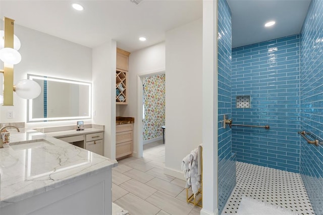 2800 E 15th St, Edmond, OK 73013 - full bathroom with a walk in shower, vanity, and recessed lighting