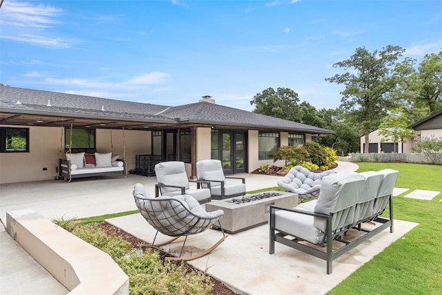 2800 E 15th St, Edmond, OK 73013 - view of patio featuring an outdoor living space with a fire pit