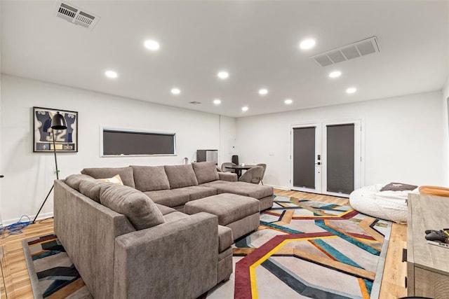 2800 E 15th St, Edmond, OK 73013 - living area featuring light wood-style flooring, recessed lighting, and french doors