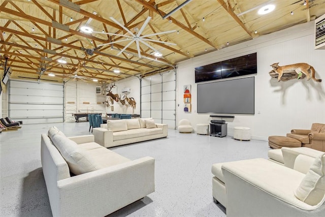2800 E 15th St, Edmond, OK 73013 - living area with a garage and speckle patterned floor