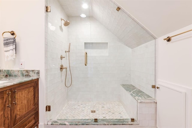 814 NE 18th St, Oklahoma City, OK 73105 - full bath featuring a shower stall, vaulted ceiling, and vanity