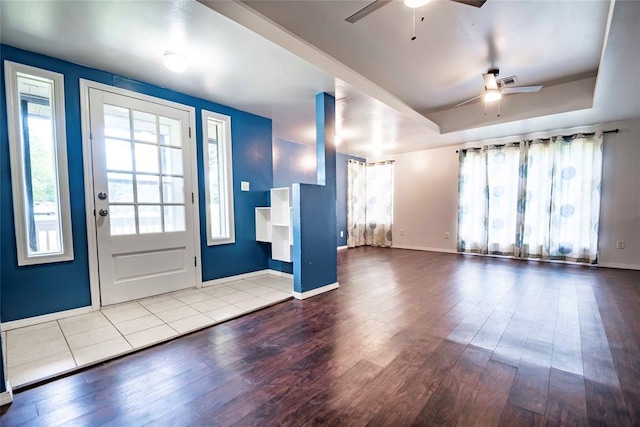 201 E 2nd St, Stroud, OK 74079 - entryway with a ceiling fan, wood finished floors, and a tray ceiling