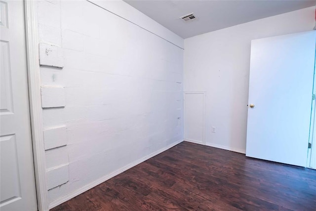 201 E 2nd St, Stroud, OK 74079 - spare room with wood finished floors and baseboards