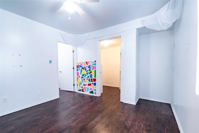201 E 2nd St, Stroud, OK 74079 - unfurnished bedroom with wood finished floors and baseboards