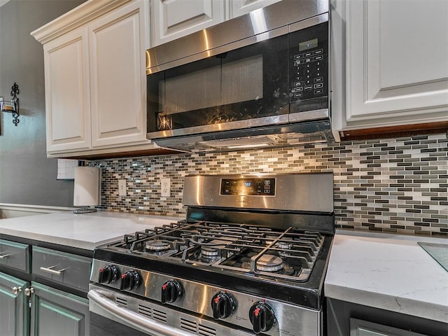 2724 SE 97th St, Oklahoma City, OK 73160 - kitchen featuring stainless steel appliances and tasteful backsplash